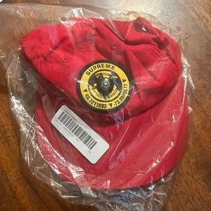 Selling brand new Supreme hat still wrap in plastic